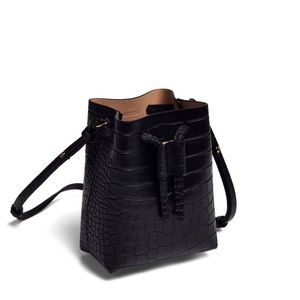 Back snake skin Nanushka mini bucket bag!